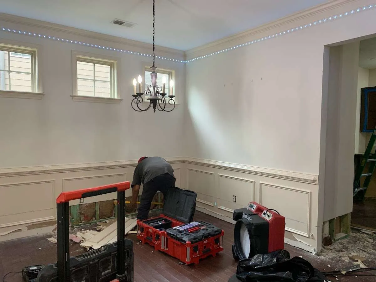 Restoration technician with professional equipment in Grand Blanc